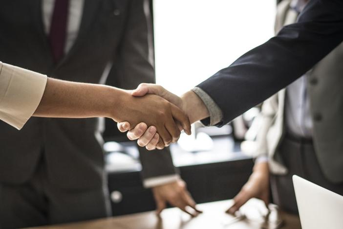 business people shaking hands